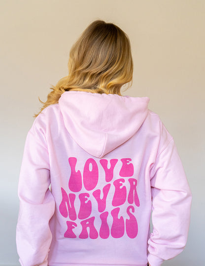 Love Never Fails | Pink Hoodie